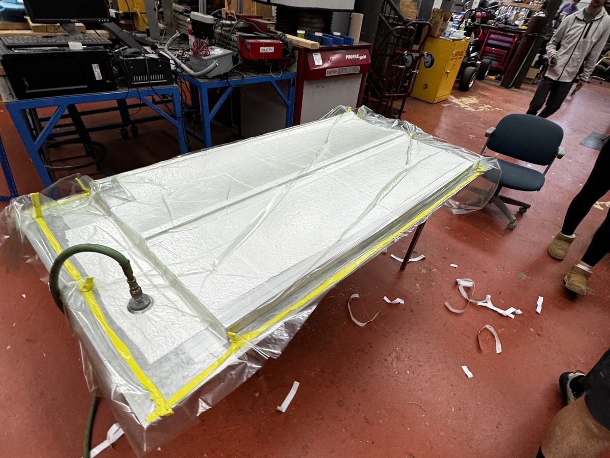 Mold sealed under vacuum bag on the bench before cure