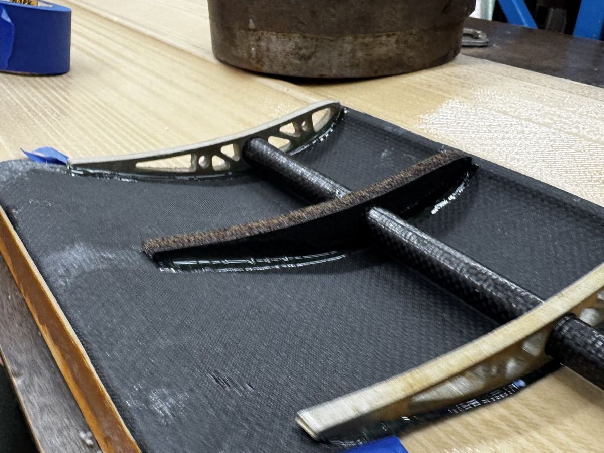Cured carbon parts and mold on the workbench