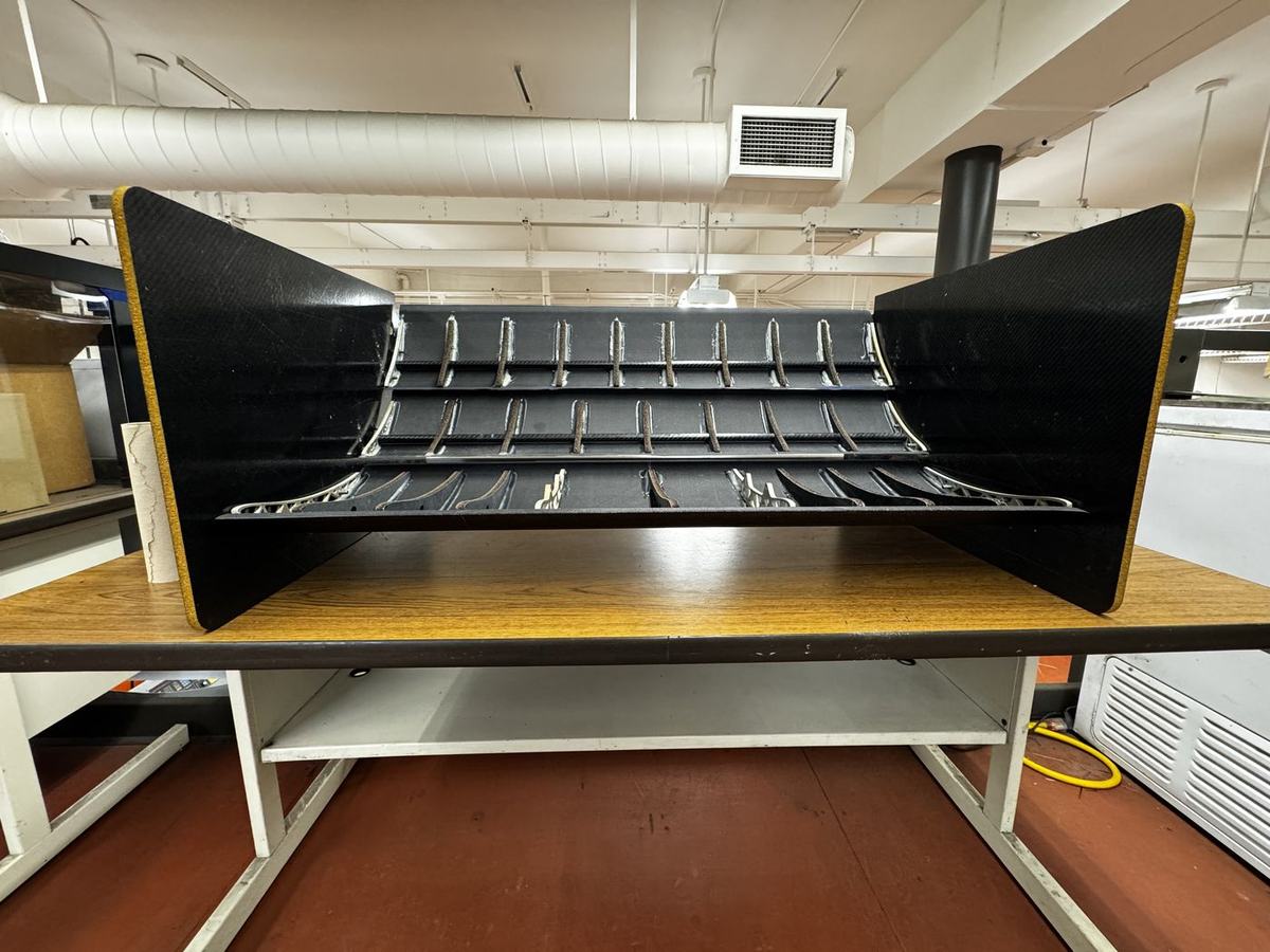 Assembled rear wing with endplates
