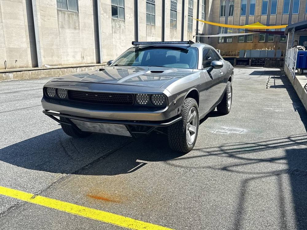 The completed Challenger off-road build, lifted and on all-terrain tires