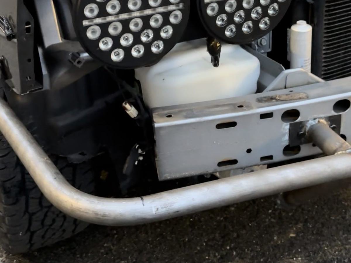 Close view of the bumper tubes tying into the factory crash structure