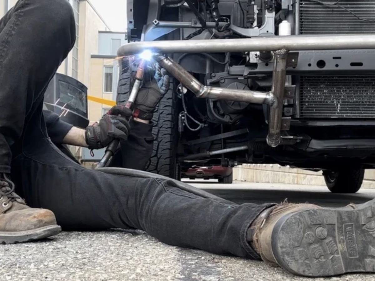 Welding the tubular bumper structure beneath the front of the car