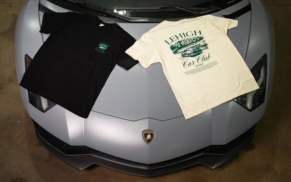 Club merchandise laid out, the last shirt design before graduating