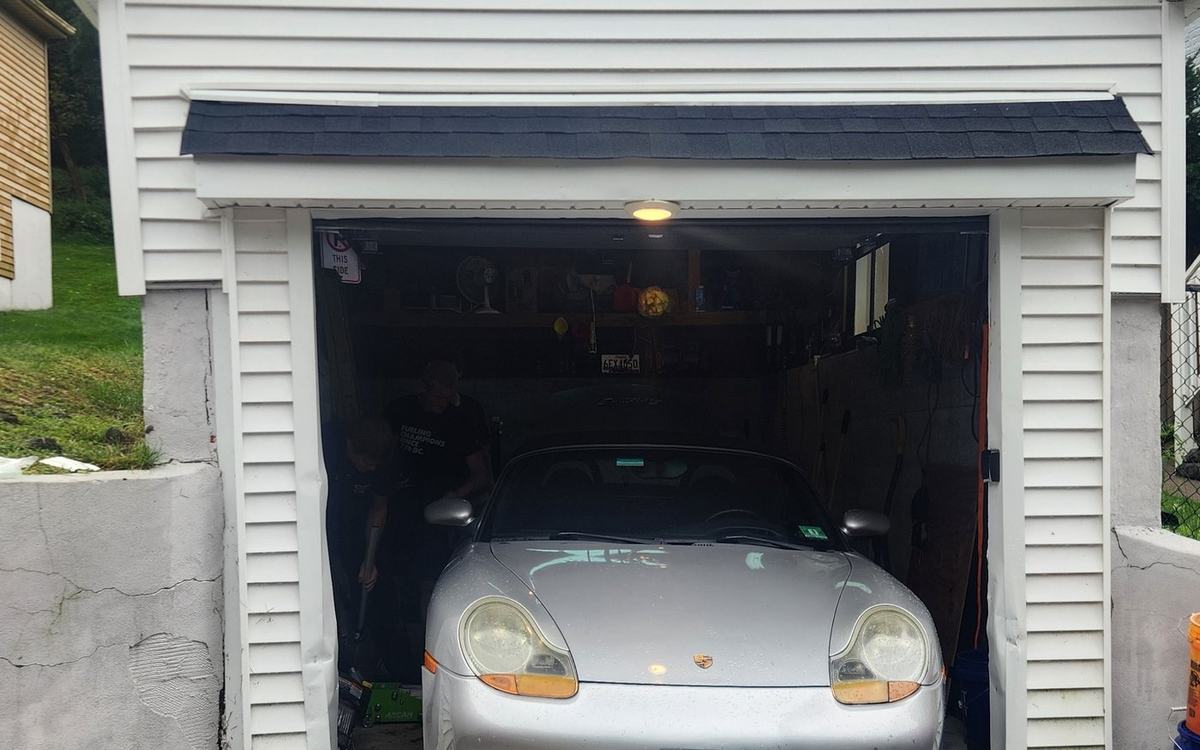 The club garage where members work on cars