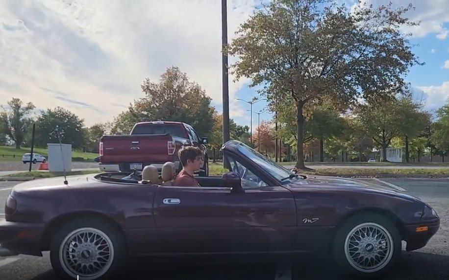 A member learning manual transmission in the club Miata