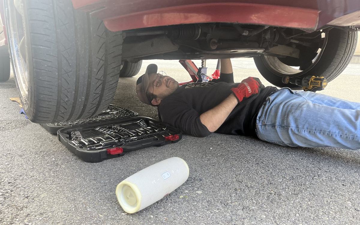 Working underneath a club member's car