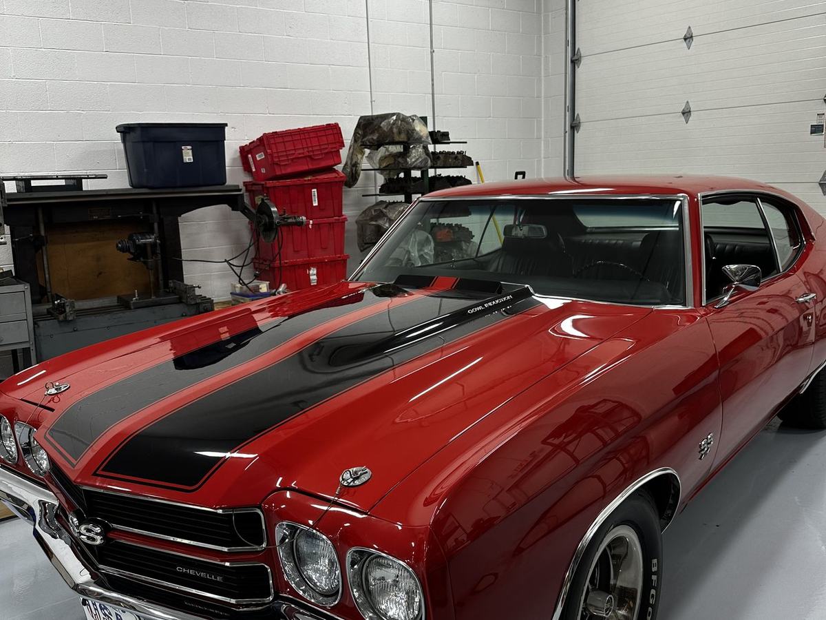 Muscle-era car in the shop for carburetor tuning