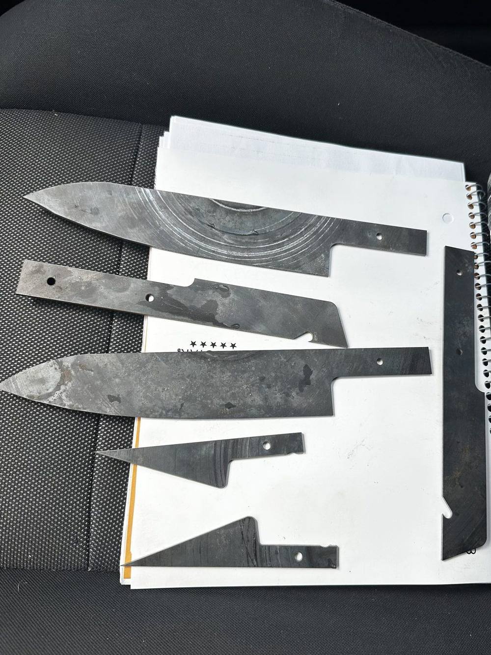 Knife blanks waterjet cut from a broken cobalt steel saw blade