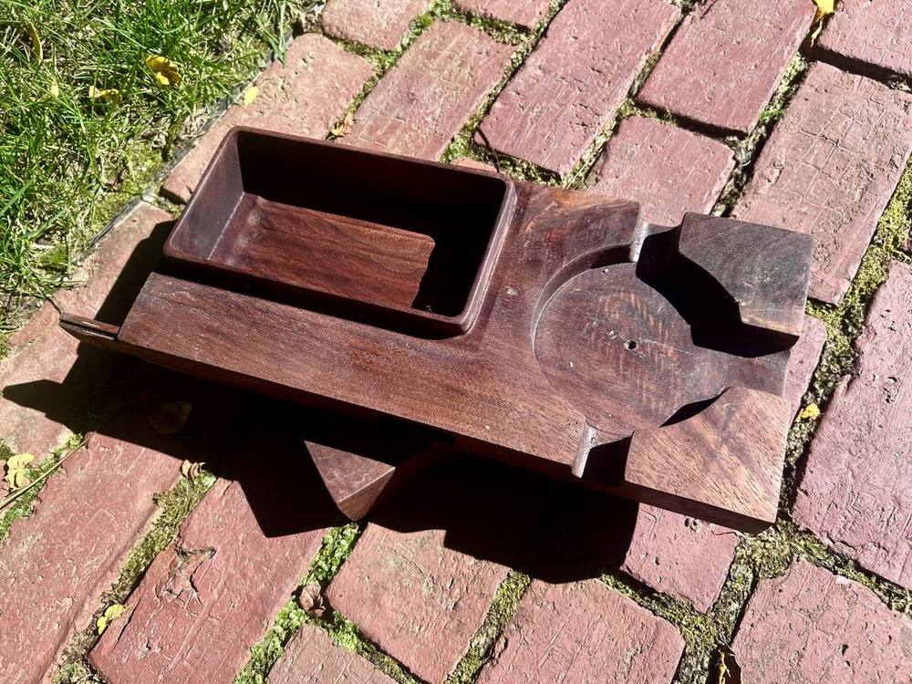 Angled view of the cigar box showing the recessed cigar rest machined into the walnut