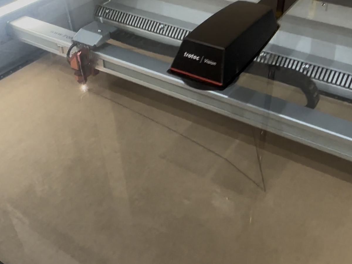 Laser cutter running a job